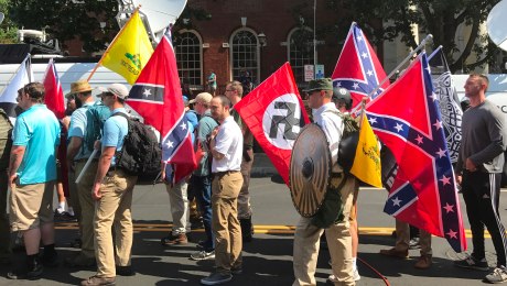 Rally participants carrying Nazi, Confederate and Gadsden flags near Emancipation Park, Charlottesville, August 12, 2017.